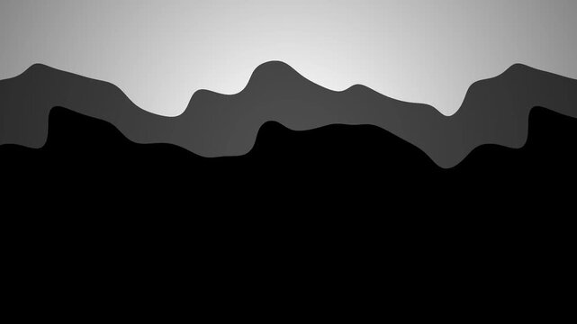 Silhouetted Mountain Peaks Under a Bright Gradient Sky