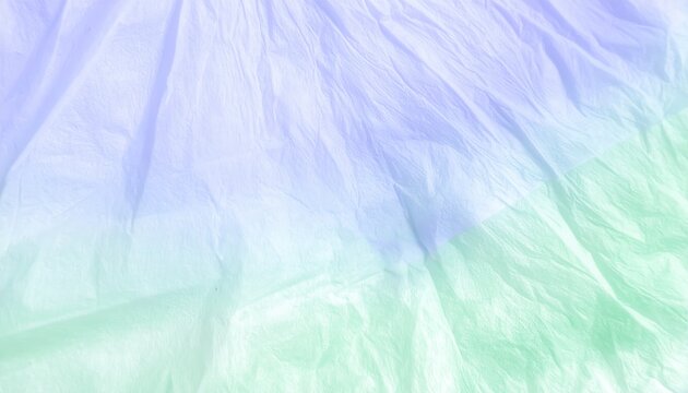 Textura abstrata de tecido amassado com gradiente suave em tons pastel de lavanda e verde menta.