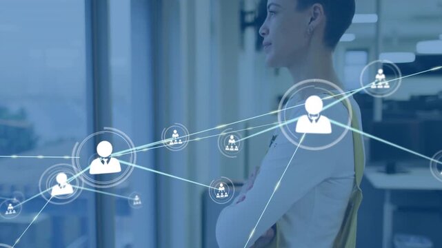 Woman standing at window, user icon appearing, network growing across tech, showing links, smiling