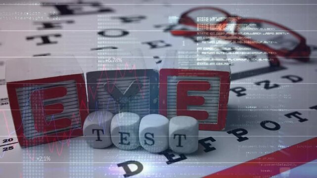 Wooden EYE blocks sitting on Snellen chart, HUD overlay moving beads forming TEST for vision