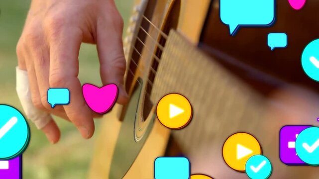 Guitarist starting fingerpicking outdoors for music sharing, icons swarming and obscuring bandage