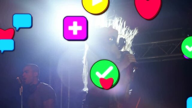 Singer bending into mic at concert social icons appearing at edges drifting in covering for fans