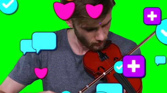 Playing gray tee violinist fingering and bowing red violin at greenscreen icons appearing for edit