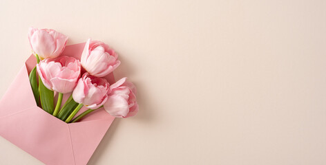 Fototapeta premium Happy Mother's Day greeting with pink tulips in a pastel envelope for spring celebration