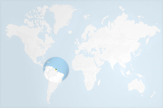 French Guiana Map with Flag in Magnifying Glass on World Map Background