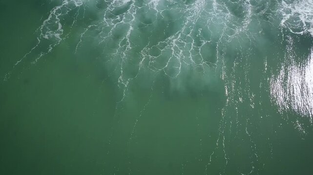 Turners Beach sits on the Eastern Australian coastline near the town of Yamba and houses many surfers as they get a salty taste of the South Pacific Ocean. The Yamba Breakwater divides the sea water.