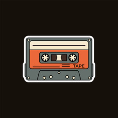 Fototapeta premium A vintage orange and grey cassette tape on a dark background. Stock Vector Groovy Sticker