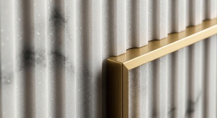 Close up modern gold metal trim on white fluted marble background design.