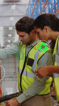 Vertical video: Man pointing scanner while woman guiding warehouse scanning, green icons overlaying