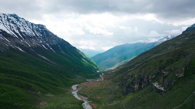 Timelapse shot of clouds moving over mountains in Kinnaur, Himachal Pradesh, India. Nature, travel and environment concept. Himalayas during summer season.