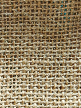 Textura de tela de yute natural con tejido de arpillera r&uacute;stico y fibras detalladas en primer plano