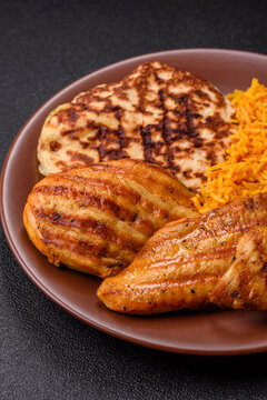 Dajaj Mashwi, an Arabic dish with rice and chicken, salt, and spices. Dajaj Mashwi as a background