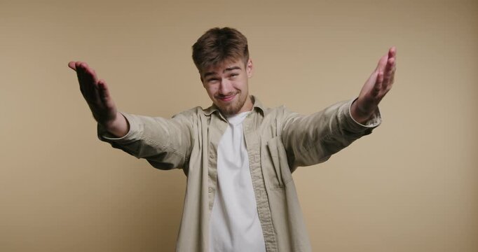 Expressive gestures of a young man conveying joy and excitement in playful and inviting manners