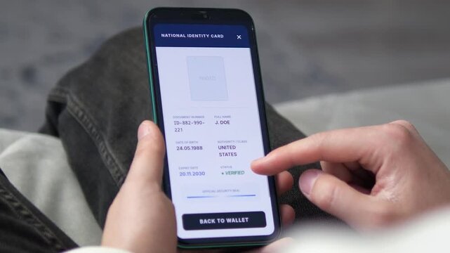 Accessing a digital national identity card on a mobile device. Shows a fully verified status and official security seal in a secure wallet app. Essential for cybersecurity, government tech, and