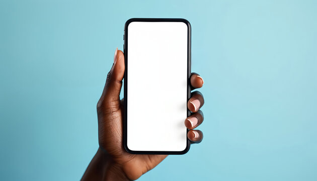 Black woman hand holding blank screen smartphone. Woman uses modern mobile phone for app or website on blue background. Device ready for content.