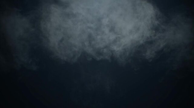 Abstract smoke cloud formation with atmospheric effects on dark background
