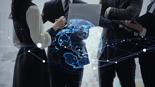 Conceptual image of a group of business people conversing in an office and a global network.