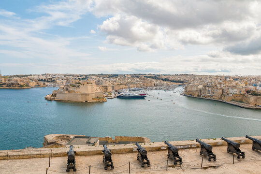 Valetta, Malta - 01 march 2026: View of the cannon-lined square in Valletta, Malta, overlooking the Three Cities &ndash; Isla, Birgu, and Kalkara &ndash; with historic architecture and scenic harbor views.