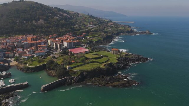 Drone flight around Mundaka on a sunny day near the end of Winter
