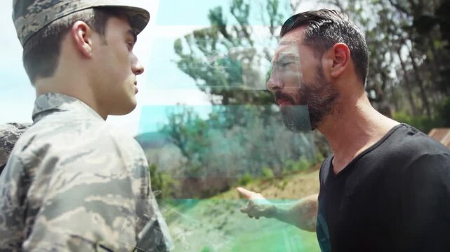This video features a male trainer leading a group of military recruits through a boot camp training