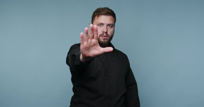 Engaging hand gestures express strong emotions during an impactful moment of connection with a clear blue backdrop