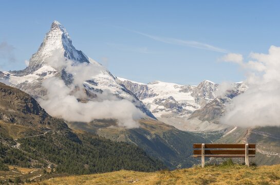 Bench with view, Five Lakes trail, snow covered Matterhorn, Zermatt, Valais, Switzerland