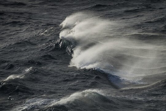 Waves with spray on high sea, North Sea