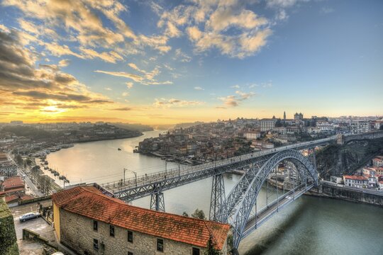 View over Porto with Ponte Dom Lu&iacute;s I Bridge across River Douro, sunset, Porto, Portugal