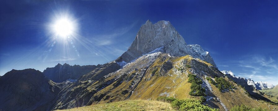 Panoramic view of the peak of Mt. Lamsenjoch, blue sky and beaming sun, Karwendel-Sonnjoch, Tirol, Austria, Europe