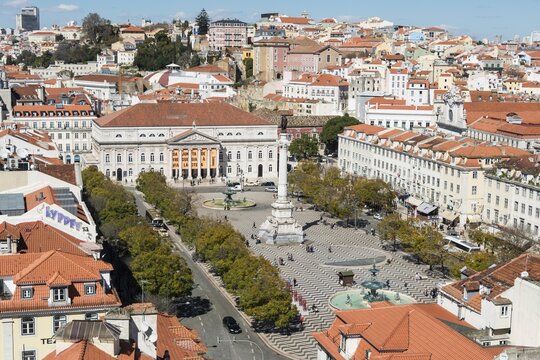 View of historic centre, statue of King Pedro IV in Rossio Square, National Theatre, Baixa, Lisbon, Portugal