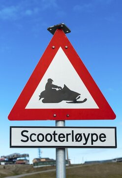 Snow mobile warning road signpost, Longyearbyen, Spitsbergen Island, Svalbard Archipelago, Norway