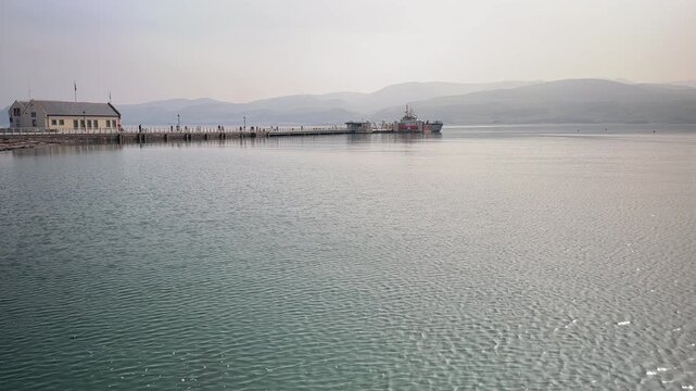 Victorian Pier at Beaumaris with the Snowdonia Mountains in the Background, Menai Strait, Isle of Anglesey, North Wales, UK