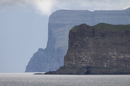 Kalsoy and Cape Enniberg, at 754 metres one of the highest vertical cliffs in the world, Dj&uacute;pini, Vi&eth;oy, Nor&eth;uroyggjar, Faroe Islands, Denmark