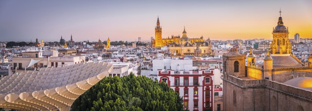 Panoramic view, city view, view from Metropol Parasol to many churches at sunset, Iglesia de la Anunciaci&oacute;n, La Giralda and Iglesia del Salvador, bell tower of the cathedral of Sevilla, Catedral de Santa Maria de la Sede, Sevilla, Andalusia, Spain