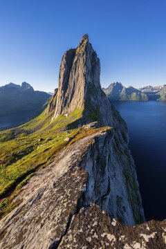 Morning atmosphere, steep mountain Segla, fjord Mefjorden with mountains, island Senja, Troms, Norway