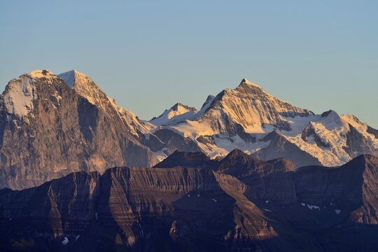 Eiger North Face with Eiger, Monch and Jungfrau mountains in the morning light, Brienzer Rothorn Mountain, Brienz, Switzerland, Europe