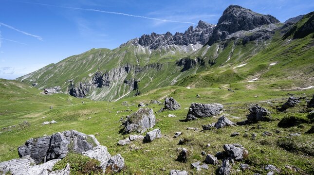 Rocks on an alpine meadow, rocky peaks of Muttlerkopf, &Ouml;fnerspitze and Krottenspitze in the background, Kemptner H&uuml;tte on the left, Heilbronner Weg, Oberstdorf, Allg&auml;u, Bavaria, Germany