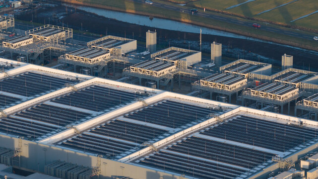 Aerial view of the Datacenter Winschoten featuring extensive cooling systems and solar panels on the roof Winschoten, Netherlands.