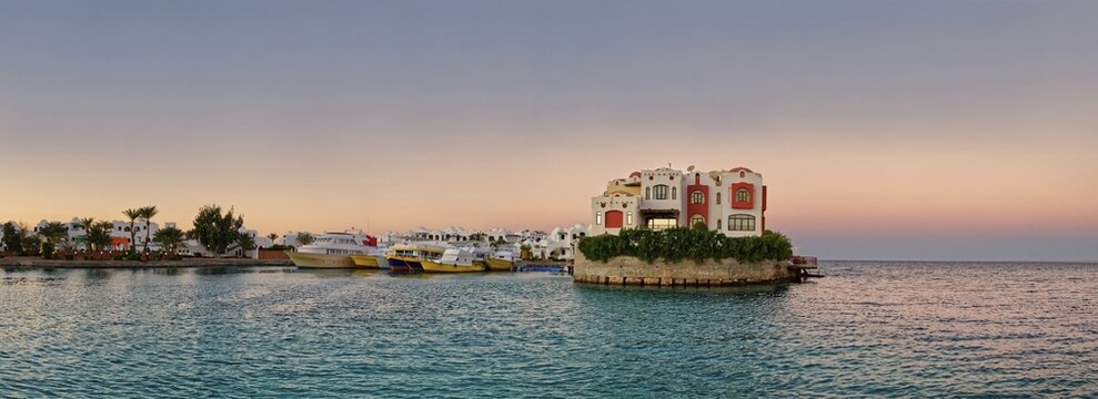 Boat port with small peninsula at sunset, Blue Water Dive Resort, Hurghada, Red Sea, Egypt