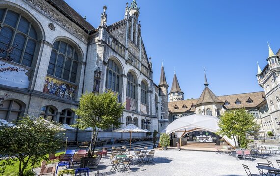 Inner courtyard, garden courtyard with tables and chairs, Swiss National Museum, Zurich, Switzerland