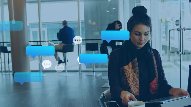 Animation of message and speech bubbles icons over caucasian woman using digital tablet at cafe