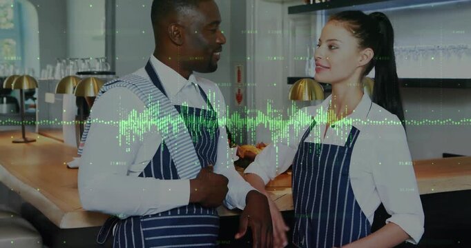 Two caf&eacute; baristas engaging exchange behind counter, with green audio waveform leading into laughter