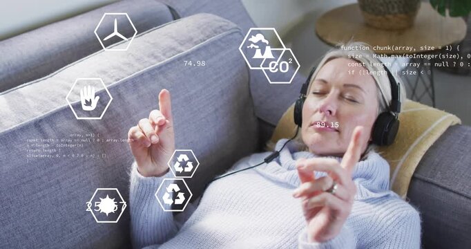 woman reclining flexing fingers activating technology interface exploring renewable energy metrics
