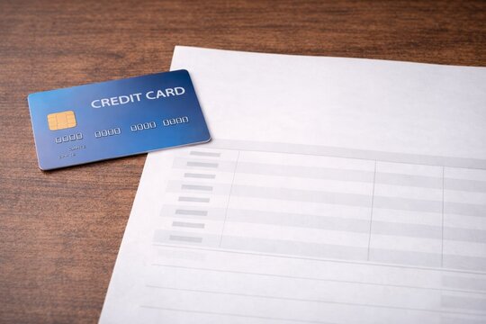 Credit Card Next To Blank Statement