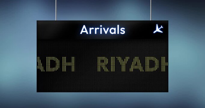 Airport arrivals board showing Riyadh destination with illuminated airplane icon on blue background for travel concept
