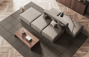 Top view interior design scene with modular sofa, wood table and floor lamp on neutral flooring background, concept of modern comfort and harmony, 3D Rendering © ImageFlow