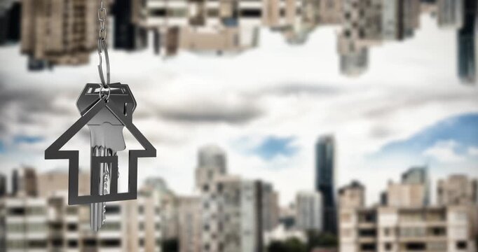 Animation of silver house key fon with key over out of focus cityscape