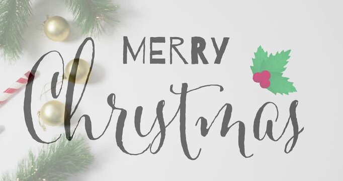Animation of christmas greetings text over christmas decorations