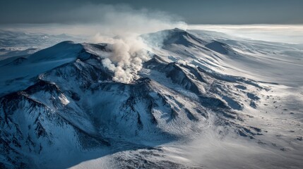 Obraz premium Majestic Volcano's Snowy Summit: A towering volcano, draped in snow, erupts with a plume of smoke against the backdrop of an overcast sky.