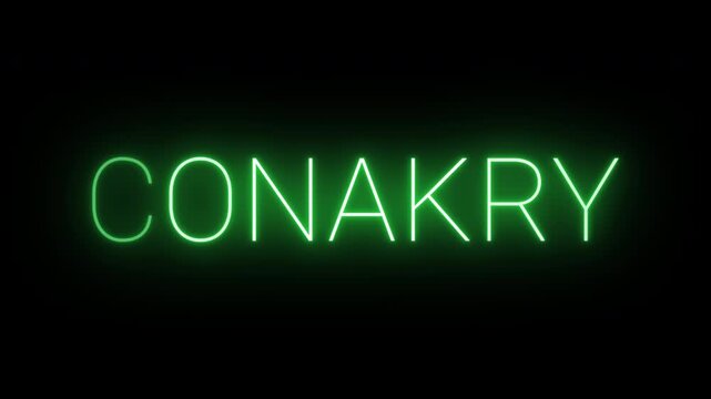 Flickering neon green glowing conakry sign animated on black background